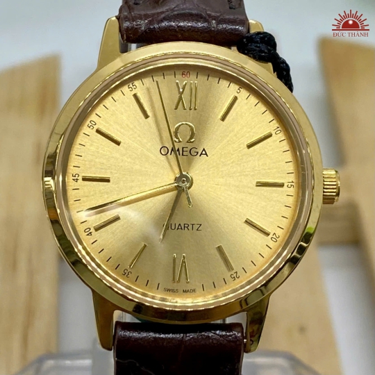 Đồng Hồ Nữ Omega A003L - Mặt Vàng Niềng Vàng