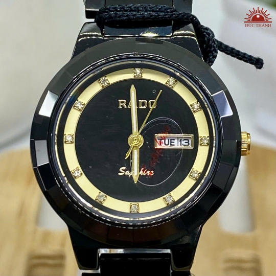 Đồng Hồ Nữ Rado - Mặt Đen Vàng Niềng Đen Đá Sapphire - 680L