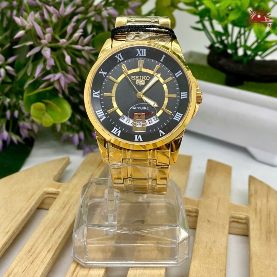 Đồng Hồ Nam Seiko- Mặt Đen Niềng Vàng - SE970527